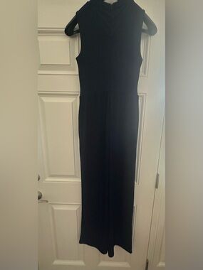 Classic Sleeveless Navy Romper with pockets.  Full zipper up the back